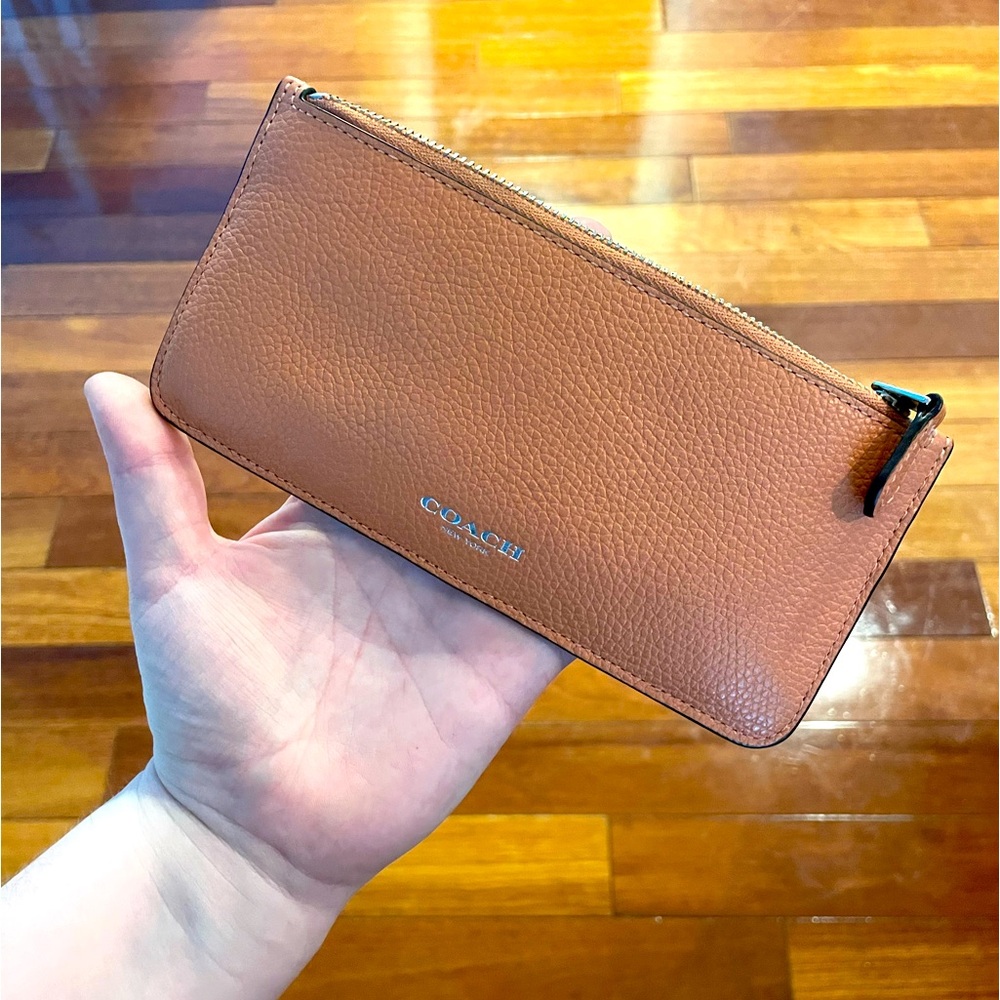 Gently used COACH peach wallet